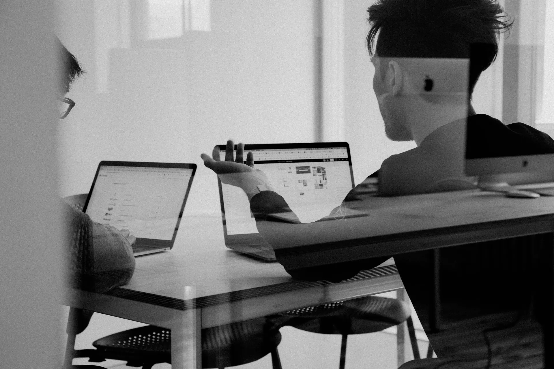 Business professionals discussing a framework roadmap during a briefing